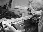 Dan Erlewing checks out a new, improved Stewart MacDonald Fret Scale Rule