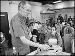 Steve Andersen demonstrates how to fit the bridge of a archtop guitar at 2006 GAL Convention