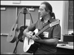 Dave Freeman gives a lecture about scale length, neck width, neck shape and action height