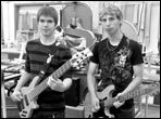 Two students show their guitars at the Waldheim School of Industrial Arts