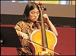 Miriam Chong playing a cello