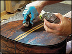 David Wren finishing a guitar