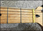 Mark French made some modifications to the nut of a Squier Stratocaster.