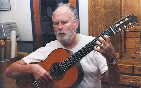 Picture of Steve Newberry playing a guitar