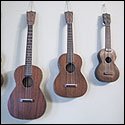 A set of Martin ukuleles in various sizes