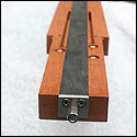 Truss rod firmly sits in channel