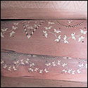 Flower inlay of a sintir