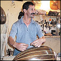 Blad Boujmaa working on the bowl of a oud