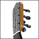 Shows the headstock of a newly finished pegged guitar