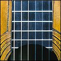 The top joint above the soundhole is open and agape on this 1888 Torres guitar