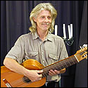 Marvis Davis with a 10-string classical guitar