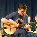 James Grace plays one of Mervin Davis's "smooth Talker" guitars