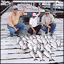 Mark Chanlynn (right) and his son Matt in the center.