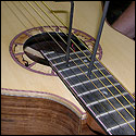 Chris Jenkin' neck adjustment system on a guitar built by his son Jeremy