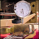 Small weight was placed at the 10th fret adn the deflection was read on the dial gauge