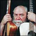 John Fahey, one of Sheppard’s guitar idols, with an early Sheppard Hawaiian guitar (on left).