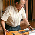 Examining Barrios’ guitar at the Cabildo Museum.