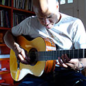 Mark Whitfield plays a Marchione classical guitar