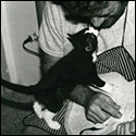 Fabio Ragghianti carving a mandolin top with a little helper, 1982