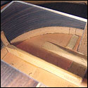 UUsing a mirror to see the bracing and kerfing on the upper bout on a 1930 Santos Hernandez guitar