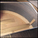 Using a mirror to view the other side of the upper bout on a 1930 Santos Hernandez guitar