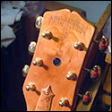 The peghead of Mike McCarten's guitar