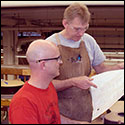 Robbie O'Brien going over some details with a student at the Red Rocks Community College