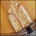 Carved tailpiece of the Wade-0-lin