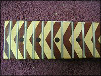 Close up view of chevron fingerboard