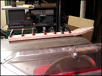 A table saw being used as a flat clamping surface