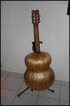 Back view of a stave-backed 6 string guitar